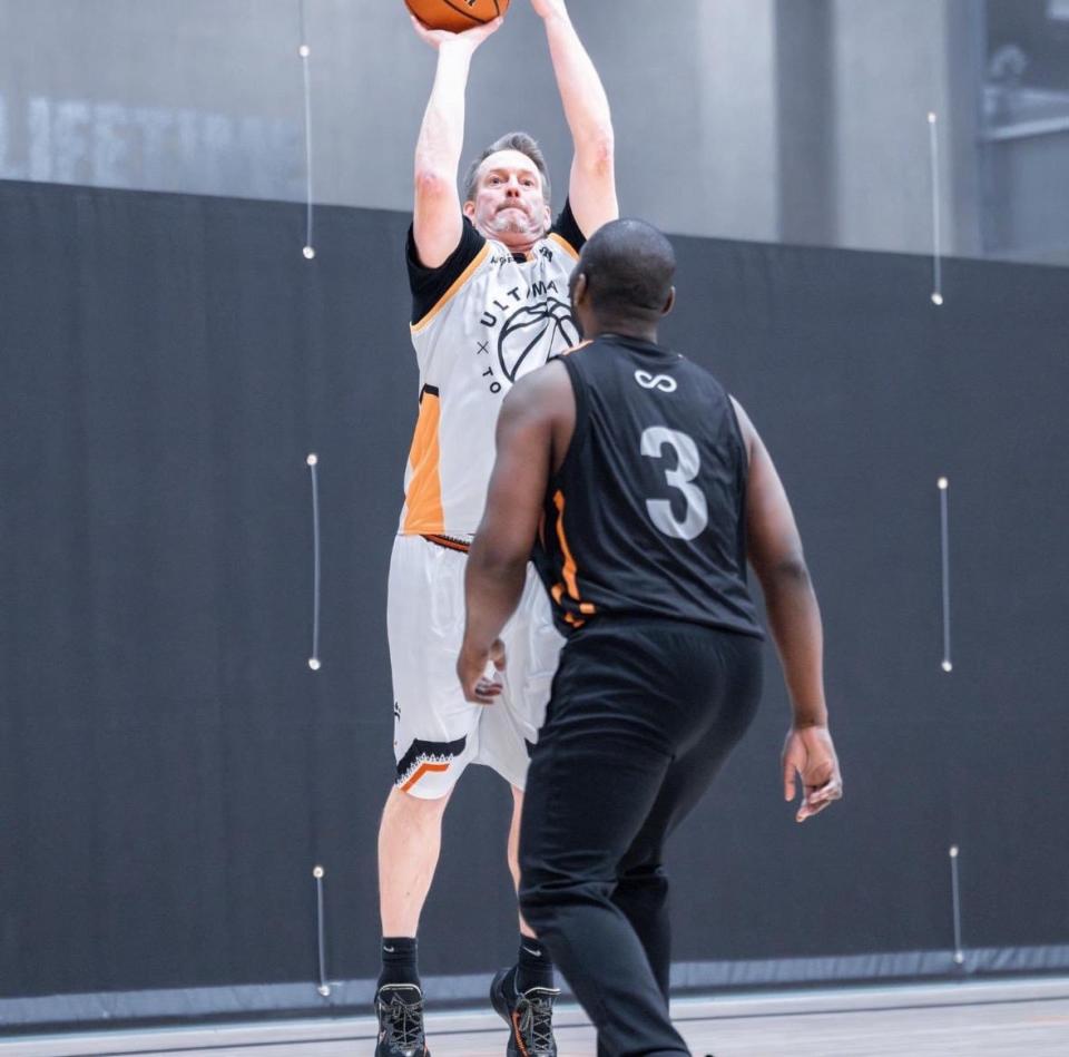 Jay Harris shoots a shot while playing in an Ultimate Hoops basketball league game in New York.