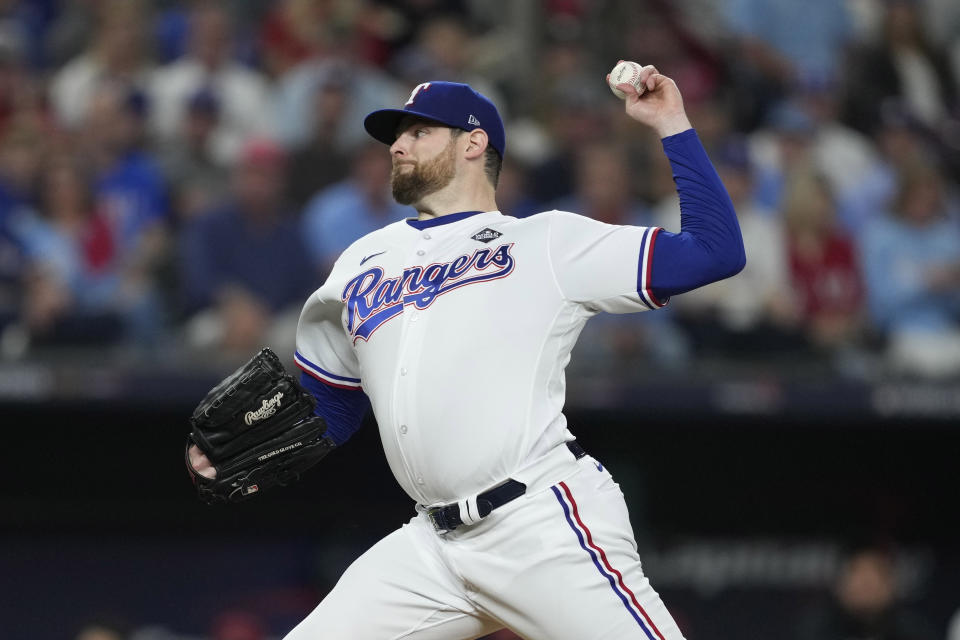 FILE - Texas Rangers starting pitcher Jordan Montgomery throws to an Arizona Diamondbacks batter during the first inning in Game 2 of the baseball World Series, Oct. 28, 2023, in Arlington, Texas. The Diamondbacks have agreed with Montgomery on a $25 million, one-year deal with a vesting option for 2025, according to a person familiar with the deal. The person spoke to The Associated Press on condition of anonymity Tuesday, March 26, because Montgomery still has to pass a physical. (AP Photo/Godofredo A. Vásquez, File)