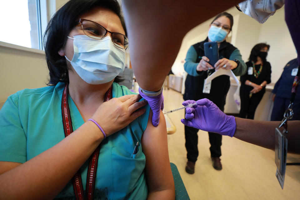 Medical staff at the Northern Navajo Medical Center were among the first in the Navajo Nation to receive their Pfizer-BioNTech vaccinations, on Dec. 15 in Shiprock, New Mexico. What's followed has been a successful rollout to Navajo Nation residents. (Photo: Micah Garen/Getty Images)