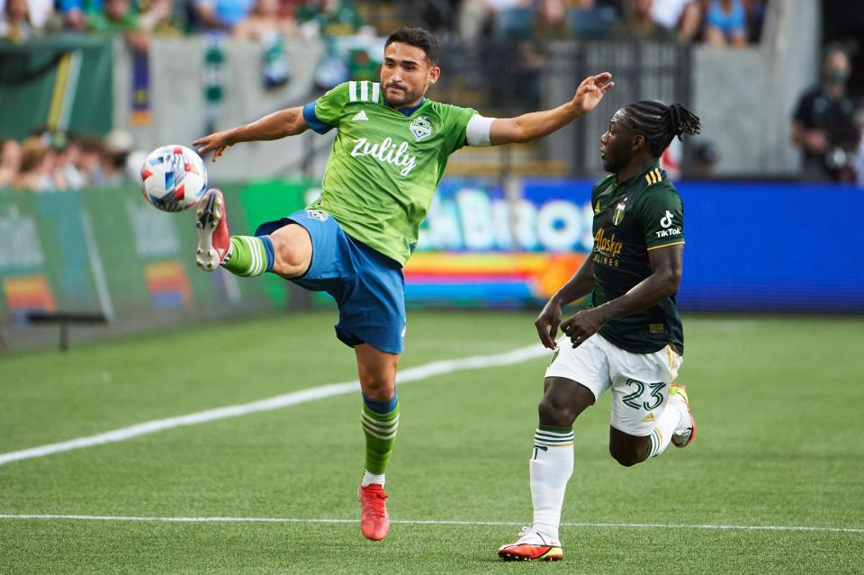Cristian Roldan controls a pass against the Portland Timbers during the Seattle Sounders' 6-2 win at Providence Park on Sunday night.