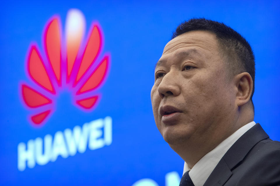 Song Liuping, chief legal officer of Huawei, speaks during a press conference at Huawei's campus in Shenzhen in southern China's Guandong Province, Thursday, Dec. 5, 2019. Chinese tech giant Huawei is asking a U.S. federal court to throw out a rule that bars rural phone carriers from using government money to purchase its equipment on security grounds. (AP Photo/Mark Schiefelbein)