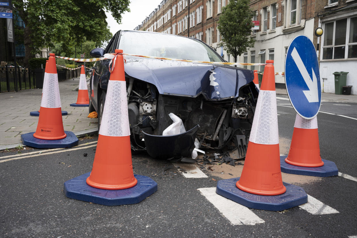 insurance The wreckage of a crashed car remains surrounded by hazard tape and traffic cones on Coldharbour Lane in Brixton, on 6th June 2022, in south London, England. (Photo by Richard Baker / In Pictures via Getty Images)