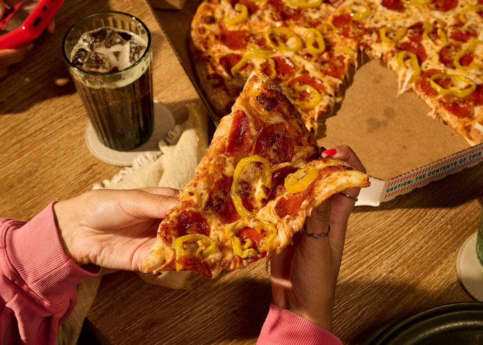 Domino's Pizza announced Monday it is introducing New York-style pizza to its menus nationwide.