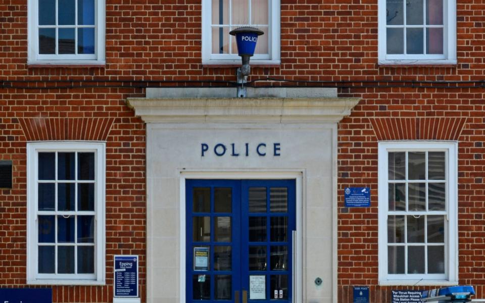 A blue lamp above the former police station in Epping, Essex