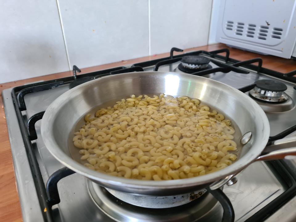 Covering the pasta with just enough water