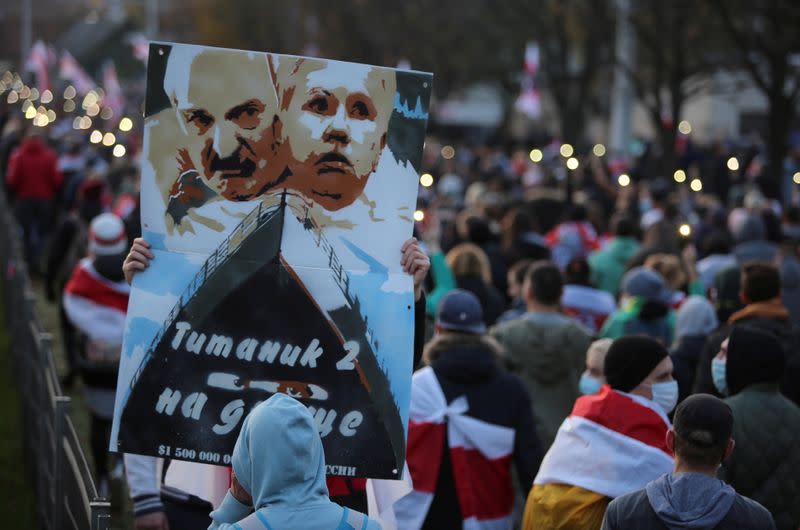 Belarusian opposition supporters hold a rally in Minsk