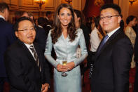 Catherine, Duchess of Cambridge poses with President of Mongolia Elbegdorj Tsakhia (L) during a reception at Buckingham Palace a reception for Heads of State and Government attending the Olympics Opening Ceremony on July 27, 2012 in London, England. (Photo by Dominic Lipinski - WPA Pool/Getty Images)
