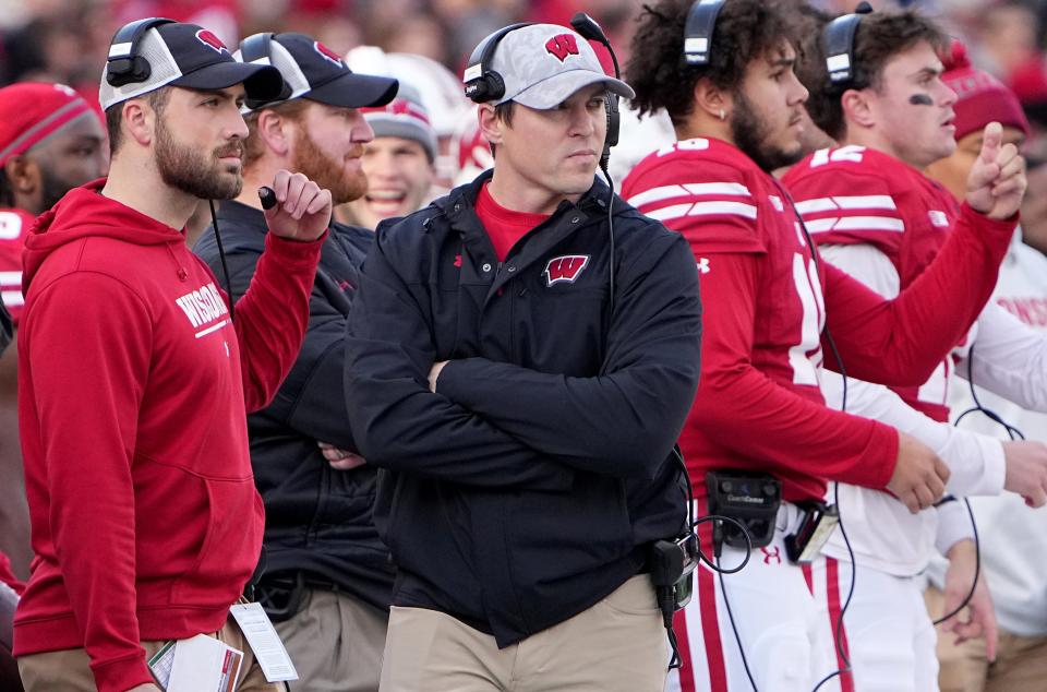 Wisconsin head coach Jim Leonhard, center, is shown  during the first quarter of their game Saturday, November 26, 2022 at Camp Randall Stadium in Madison, Wis.