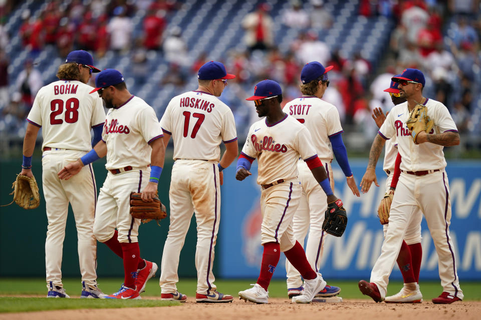 Philadelphia Phillies players celebrate after a baseball game against the Atlanta Braves, Wednesday, July 27, 2022, in Philadelphia. (AP Photo/Matt Slocum)