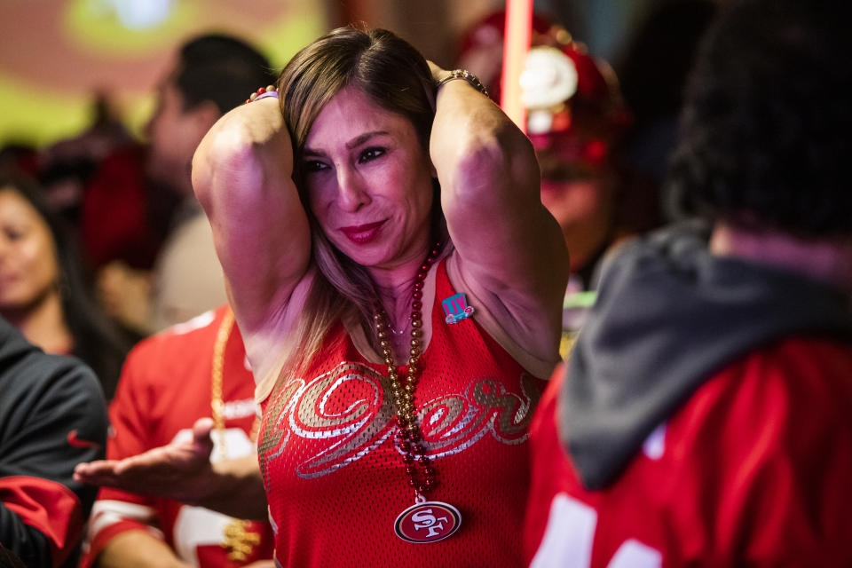 A San Francisco 49ers fan reacts while watching the San Francisco 49ers play the Kansas City Chiefs during a Super Bowl LIV watch party at SPIN San FraThe San Francisco 49ers faced the Kansas City Chiefs in Super Bowl LIV for their seventh appearance at the NFL championship, leading the game into half time and losing after 21 unanswered points in the second half of the game. (Photo by Philip Pacheco/Getty Images)