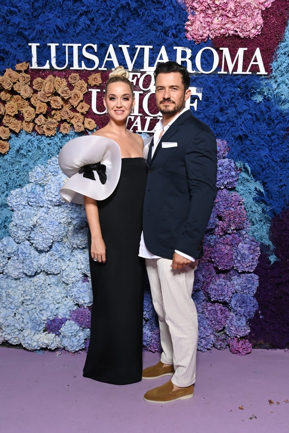 Katy Perry and Orlando Bloom attend the LuisaViaRoma for Unicef event at La Certosa di San Giacomo on July 31, 2021 in Capri, Italy.