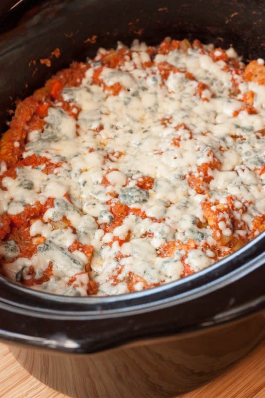 <p>A kicked up crockpot casserole with your favorite hot wings flavors. Get this <a href="https://cupcakesandkalechips.com/slow-cooker-buffalo-chicken-quinoa-casserole/" rel="nofollow noopener" target="_blank" data-ylk="slk:Slow Cooker Buffalo Chicken Quinoa Casserole;elm:context_link;itc:0;sec:content-canvas" class="link ">Slow Cooker Buffalo Chicken Quinoa Casserole</a> recipe!</p>