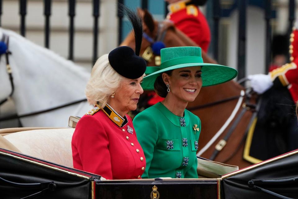 Queen Camilla and Princess Kate ride in an open-top carriage down The Mall as part of the King Charles’ first Trooping the Colour as monarch (Copyright 2023 The Associated Press. All rights reserved)