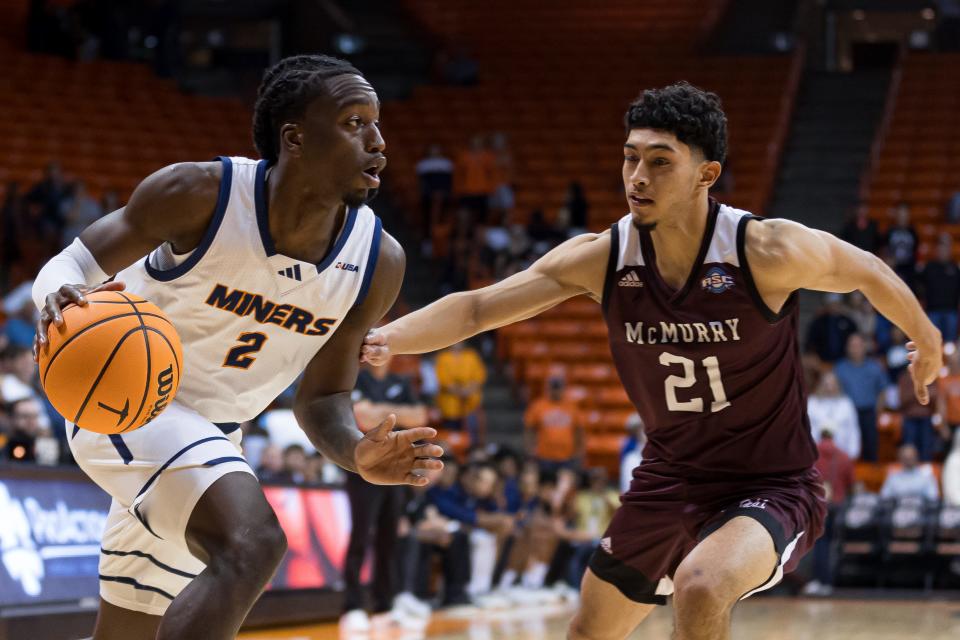 UTEP's Tae Hardy (2) and McMurry's Matt Pena (21) at a men’s basketball game on Monday, Nov. 6, 2023 at the Don Haskins Center.