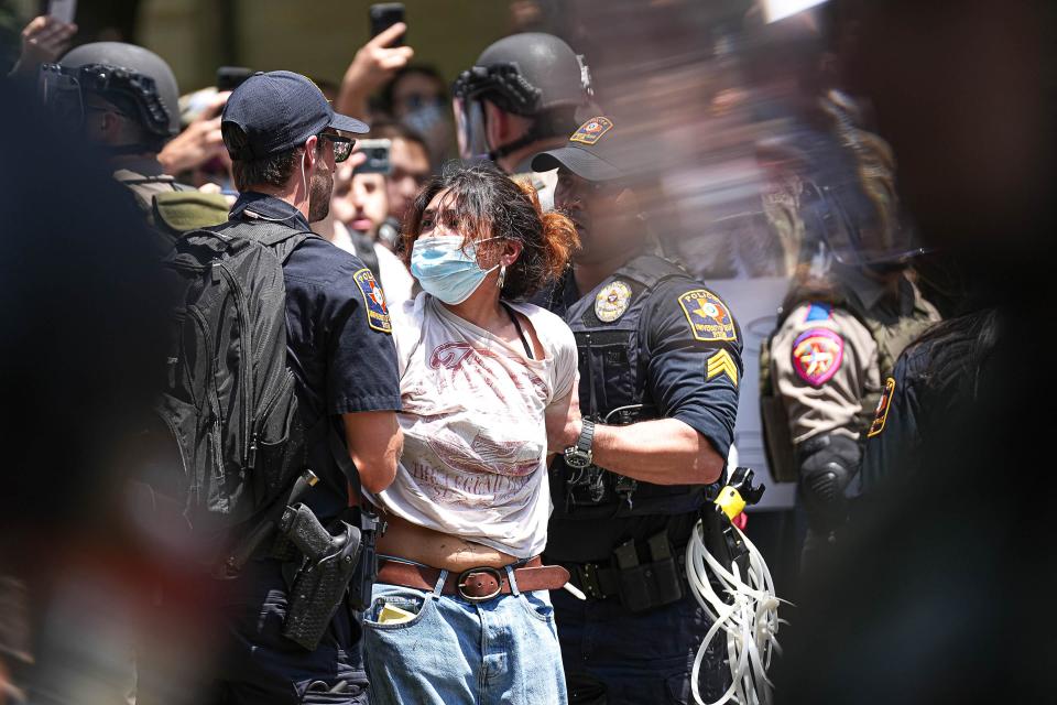 At the University of Texas at Austin on April 29, 2024, police arrest a protester at an encampment where students called attention to the war in Gaza.