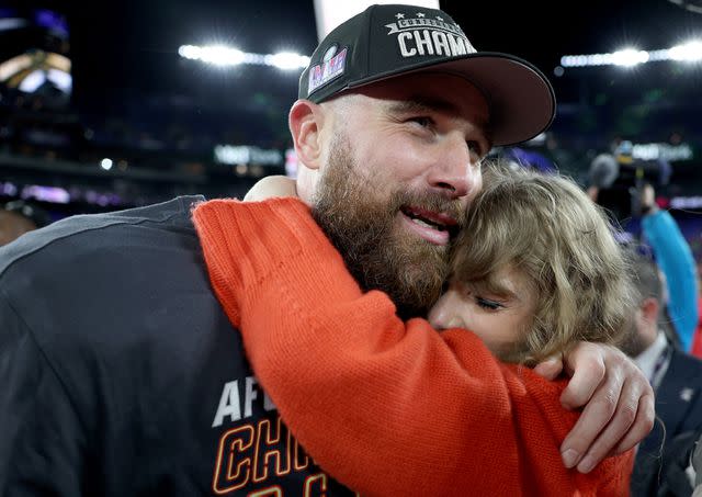 <p>Patrick Smith/Getty </p> Travis Kelce of the Kansas City Chiefs celebrates with Taylor Swift