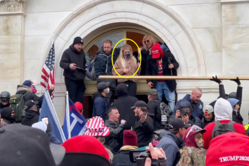 Isabella Deluca outside a Capitol building window on Jan. 6, 2021. (U.S. District Court)