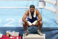 Eliad Mourad, of France refuses to leave the ring after losing a men's super heavyweight over 91-kg boxing match against Britain's Frazer Clarke at the 2020 Summer Olympics, Sunday, Aug. 1, 2021, in Tokyo, Japan. (AP Photo/Frank Franklin II)
