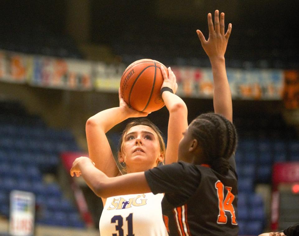 Sacred Heart-Griffin's Callie Huston attempts a shot against Lanphier during the City girls basketball tournament at the Bank of Springfield Center on Wednesday, Jan. 17, 2024.