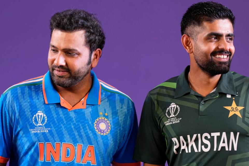 India’s captain Rohit Sharma and Pakistan’s captain Babar Azam during captain’s press conference on the eve of ICC Men’s Cricket World Cup in Ahmedabad (AP)