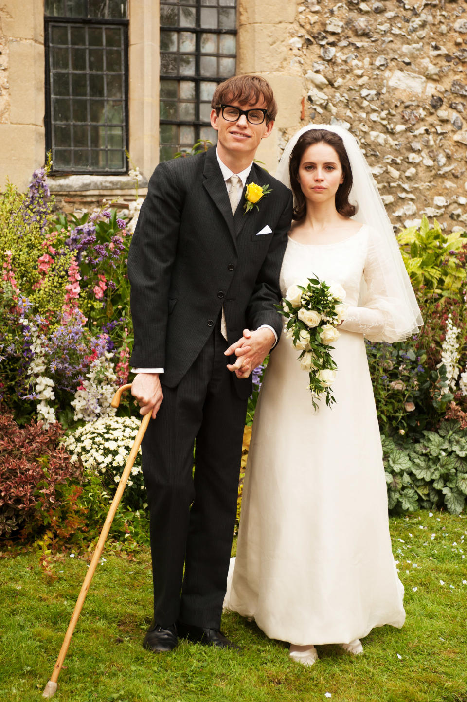 Steve Hawking and Jane Hawking wearing a suit and a wedding dress, respectively, on their wedding