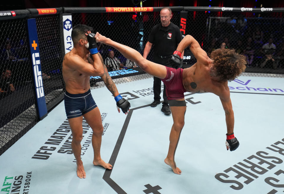 LAS VEGAS, NEVADA – AUGUST 08: (R-L) Payton Talbott kicks Reyes Cortez Jr. in a bantamweight fight during Dana White’s Contender Series season seven, week one at UFC APEX on August 08, 2023 in Las Vegas, Nevada. (Photo by Al Powers/Zuffa LLC)