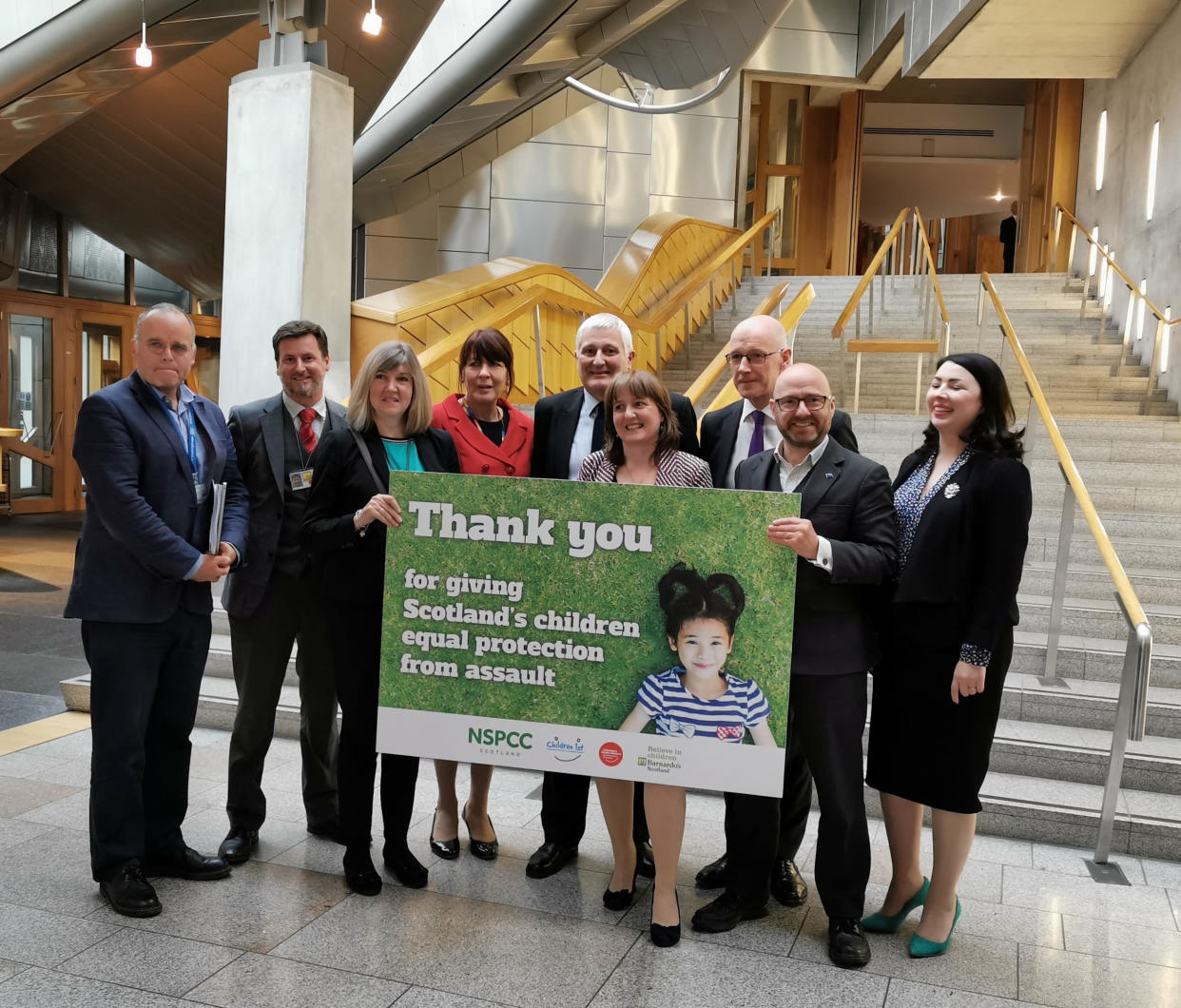 MSPs in Scottish Parliament, Edinburgh, celebrating the passing of the Children (Equal Protection from Assault) (Scotland) Bill, which means a ban on smacking of children in Scotland.