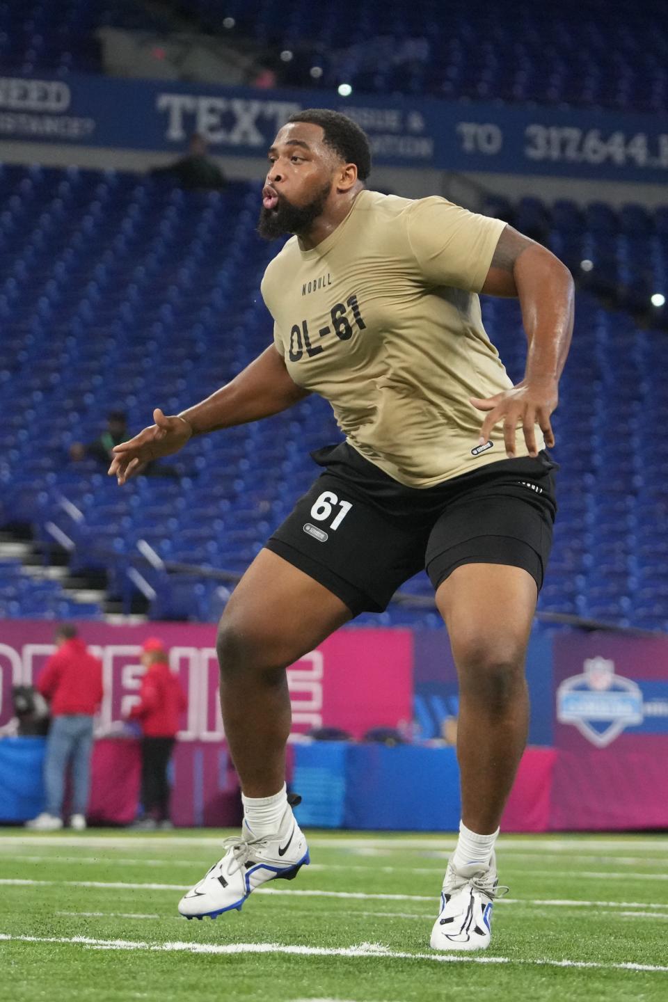 Mar 3, 2024; Indianapolis, IN, USA; Texas A&M offensive lineman Layden Robinson (OL61) during the 2024 NFL Combine at Lucas Oil Stadium. Mandatory Credit: Kirby Lee-USA TODAY Sports