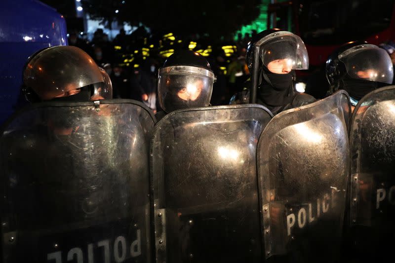 Opposition supporters protest against results of a parliamentary election in Tbilisi