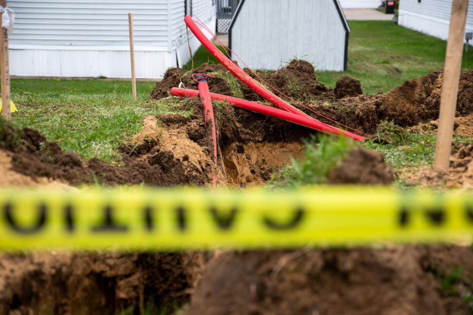 The dig site for the installation of fiber optic cable  Thursday, May 5, 2022, at Holiday West Village in Holland. 