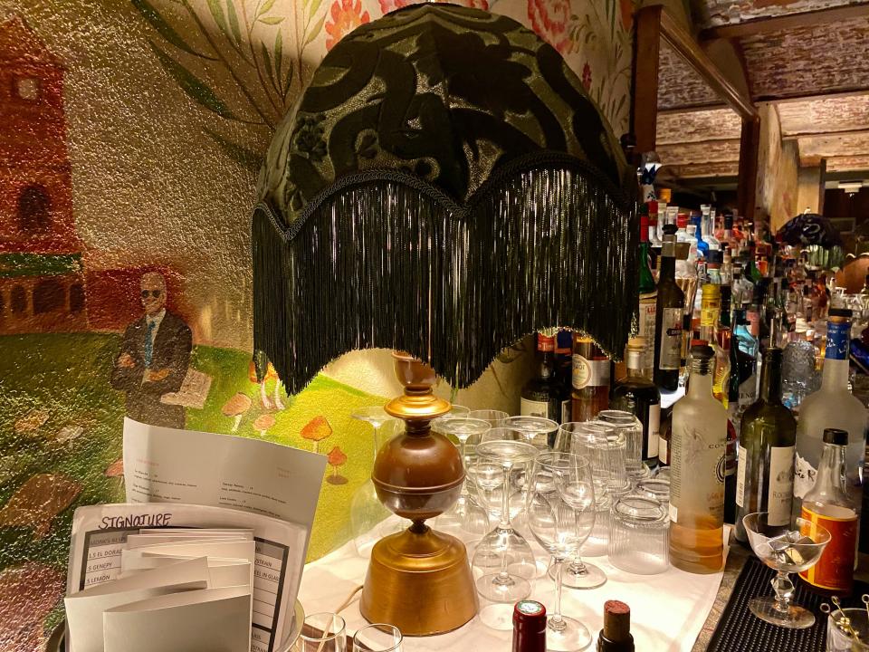 The hand-drawn mural that covers the walls at Simmer Down includes small nods to Wilmington, including small depictions of President Joe Biden and singer Bob Marley.