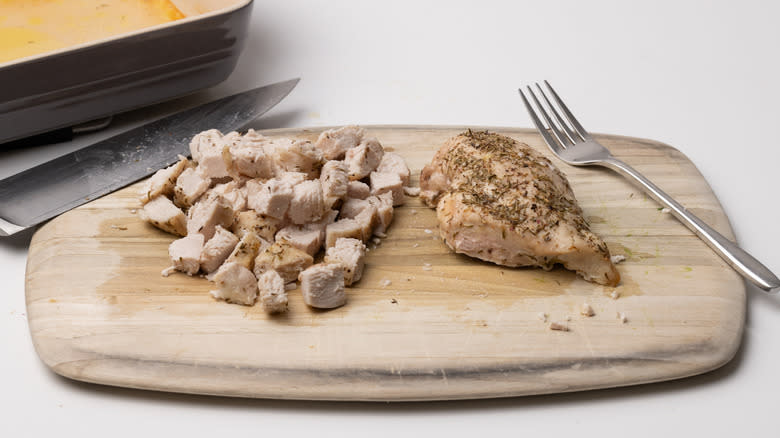 chopping baked chicken breasts