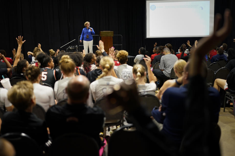 NCAA Director of Governance Susan Peal, center, gives a Life Skills seminar on National Letter of Intent to participants at the NCAA College Basketball Academy, Saturday, July 29, 2023 in Memphis, Tenn. (AP Photo/George Walker IV)