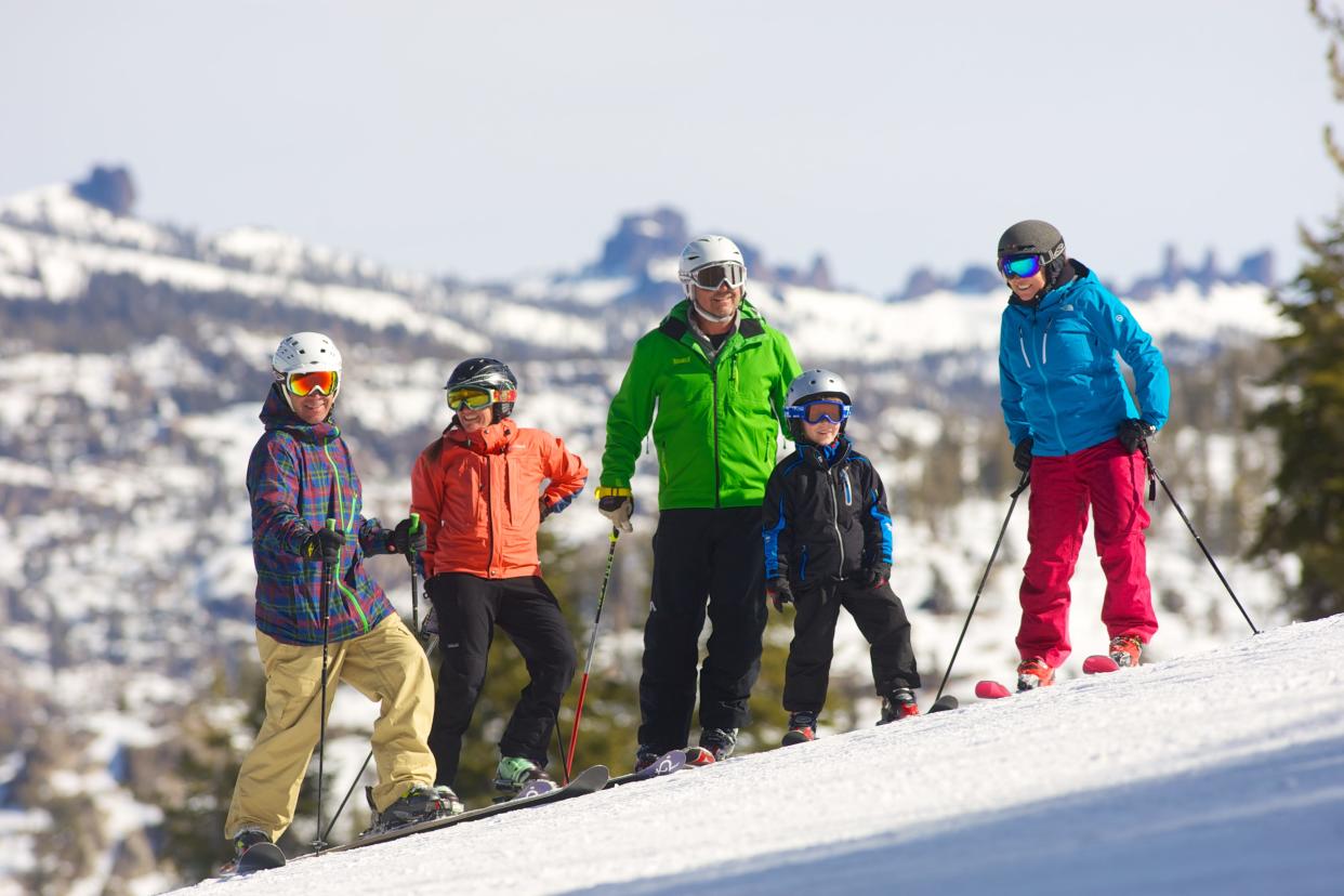 A family enjoys the view into Dodge Ridge’s Boulder Creek Canyon.