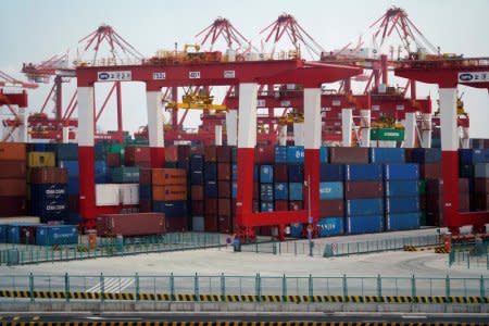 FILE PHOTO: Containers are seen at the Yangshan Deep Water Port, part of the Shanghai Free Trade Zone, in Shanghai, China March 14, 2018. REUTERS/Aly Song