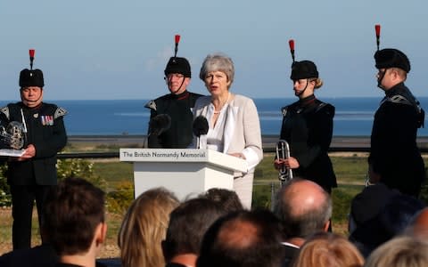 Theresa May delivering her speech - Credit: Reuters