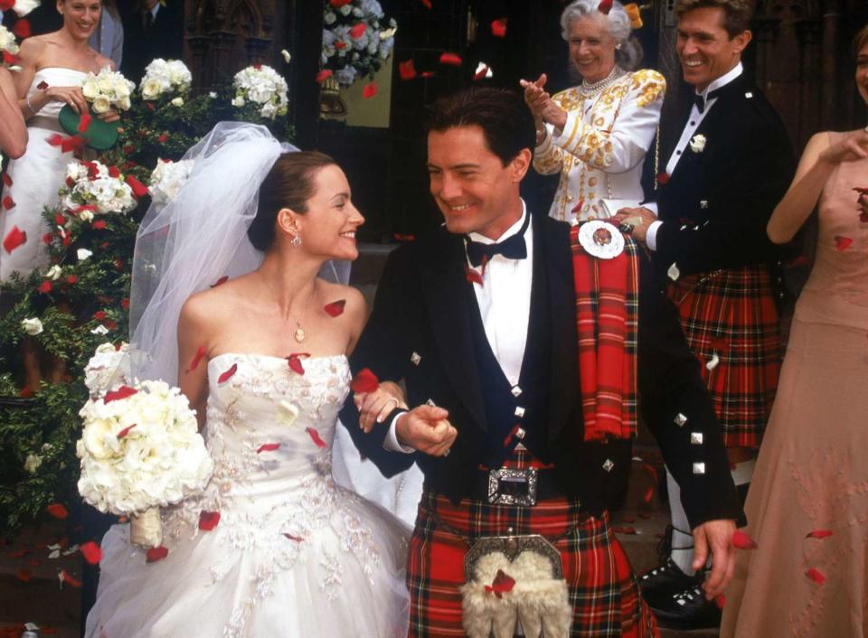 Kristin Davis as Charlotte York and Kyle MacLachlan as Trey MacDougal on their wedding day in "Sex and the city"