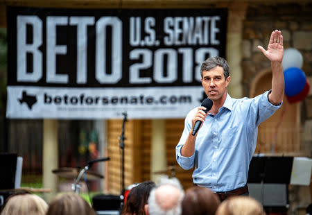 Representative Beto O'Rourke greets supporters before an event in Del Rio, Texas, U.S. September 22, 2018. REUTERS/Sergio Flores/Files