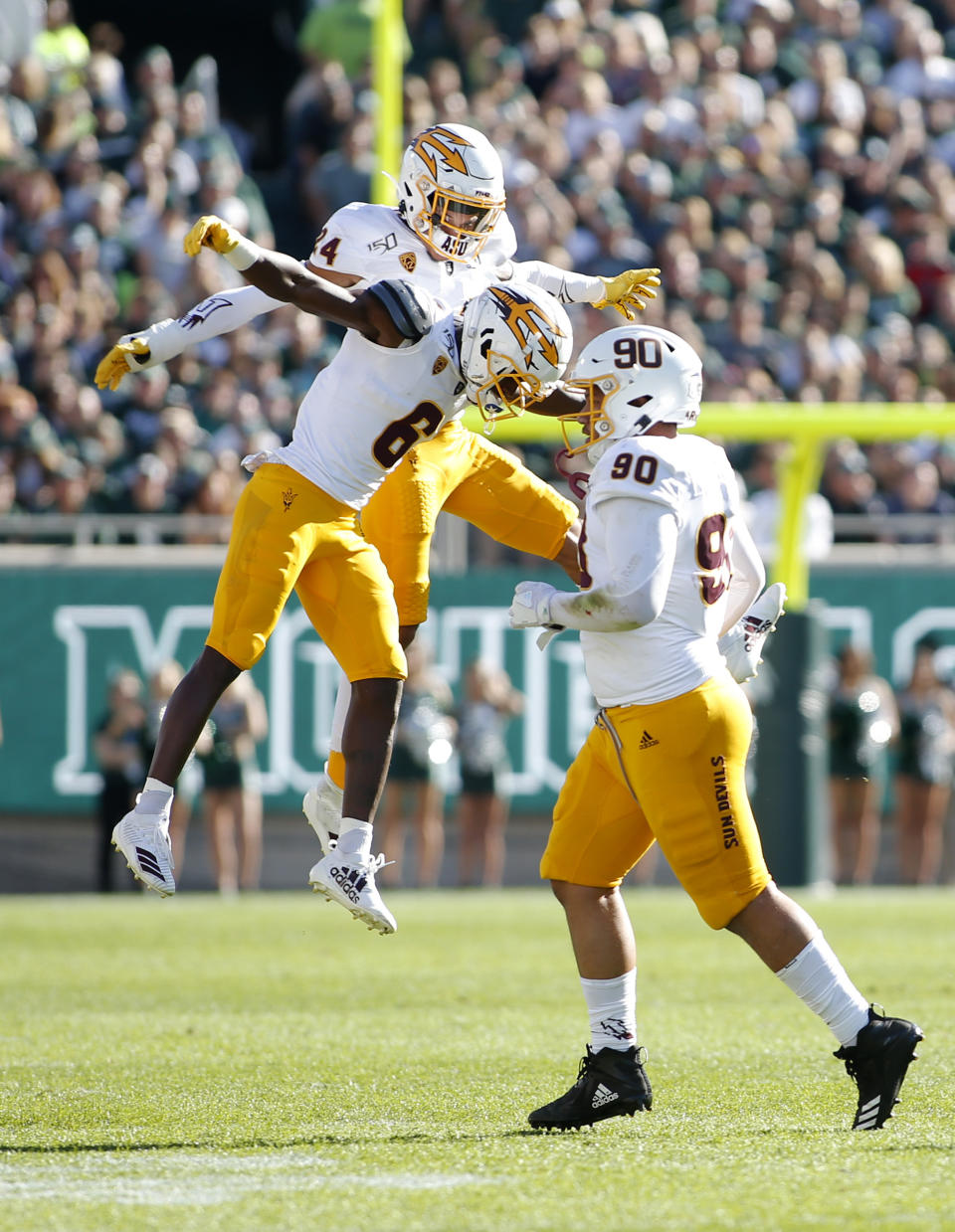 Arizona State's Chase Lucas, left, Timarcus Davis, center, and Jermayne Lole, right, celebrate after Michigan State missed a field goal during the second quarter of an NCAA college football game Saturday, Sept. 14, 2019, in East Lansing, Mich. (AP Photo/Al Goldis)