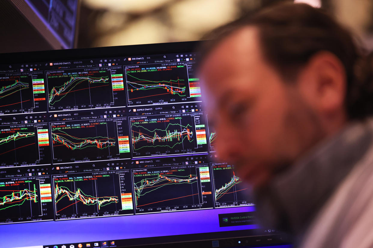 FTSE  NEW YORK, NEW YORK - JANUARY 17: Traders work on the floor of the New York Stock Exchange during morning trading on January 17, 2023 in New York City. Stocks opened low after a holiday weekend disrupting an upswing in early 2023 momentum. Goldman Sachs reported that its quarterly profit plunged 66% from a year earlier to $1.33 billion and Morgan Stanley also reported a more than $2 billion in profit for the fourth quarter, giving the company a 40 percent decline from the previous year.  (Photo by Michael M. Santiago/Getty Images)