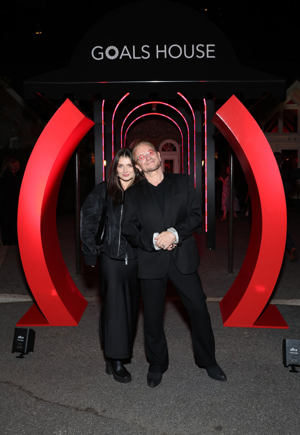 NEW YORK, NEW YORK - SEPTEMBER 22: Eve Hewson and Bono attend The (RED) Nightcap at Goals House with Brian Moynihan, Phoebe Robinson & guests, to celebrate the partners and people that have made it possible for (RED) to deliver more than $700 million to the fight against AIDS and COVID, helping more than 245 million people.  (Photo by Monica Schipper/Getty Images for (RED))