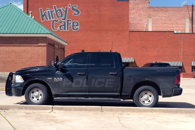A Lighthorse police vehicle parked in downtown Okmulgee. “When I asked across the street, a barber told me the policemen were likely having lunch in Kirby’s Cafe,” Blaustein says.