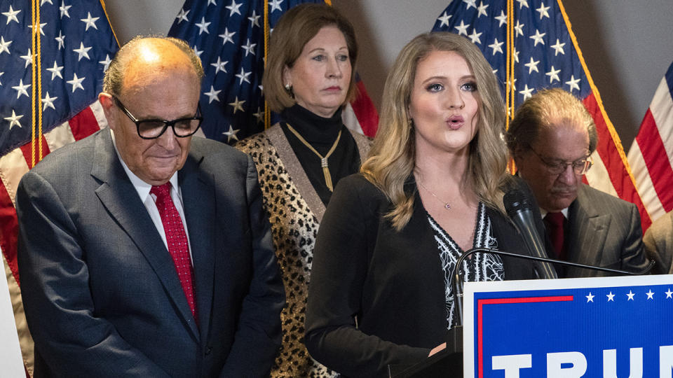 Members of President Donald Trump's legal team, including former Mayor of New York Rudy Giuliani, left, Sidney Powell, and Jenna Ellis, speaking, attend a news conference at the Republican National Committee headquarters, Thursday Nov. 19, 2020, in Washington. (Jacquelyn Martin/AP)
