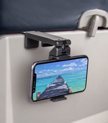 Watch movies on the airplane hands-free with this phone mount