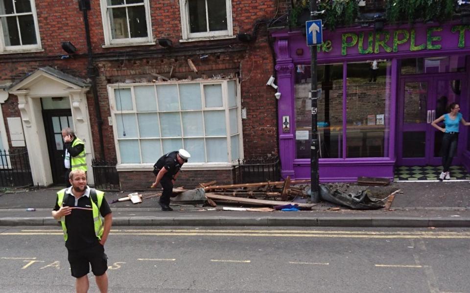 Damage outside the Purple Turtle following the crash - Credit: Nic Hoskins/SWNS