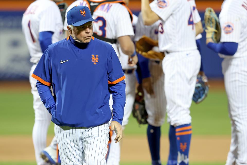 Apr 30, 2022; New York City, New York, USA; New York Mets manager Buck Showalter (11) walks back to the dugout after making a pitching change during the eighth inning against the Philadelphia Phillies at Citi Field.