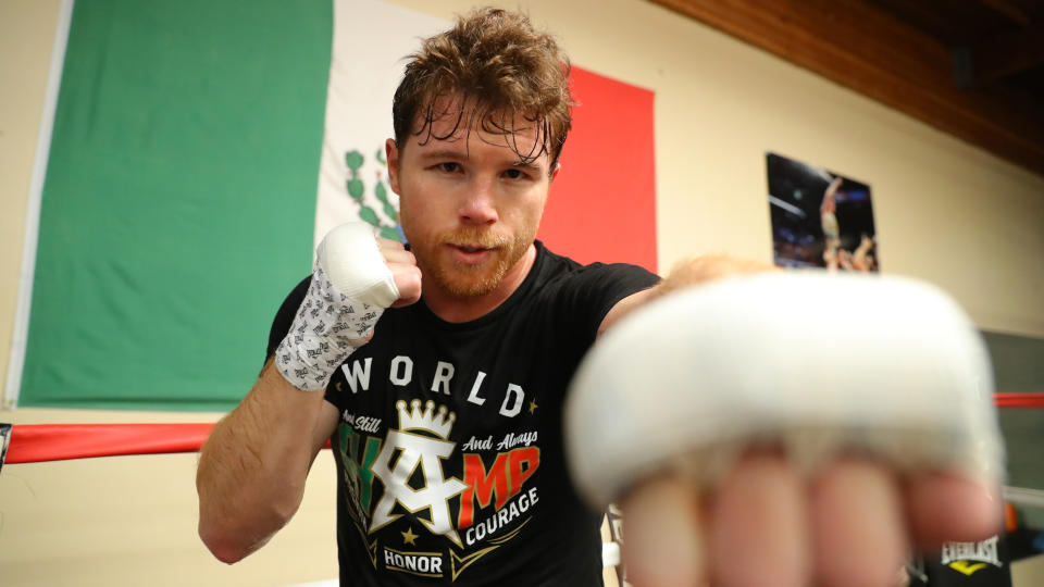 Canelo throws a punch at the camera