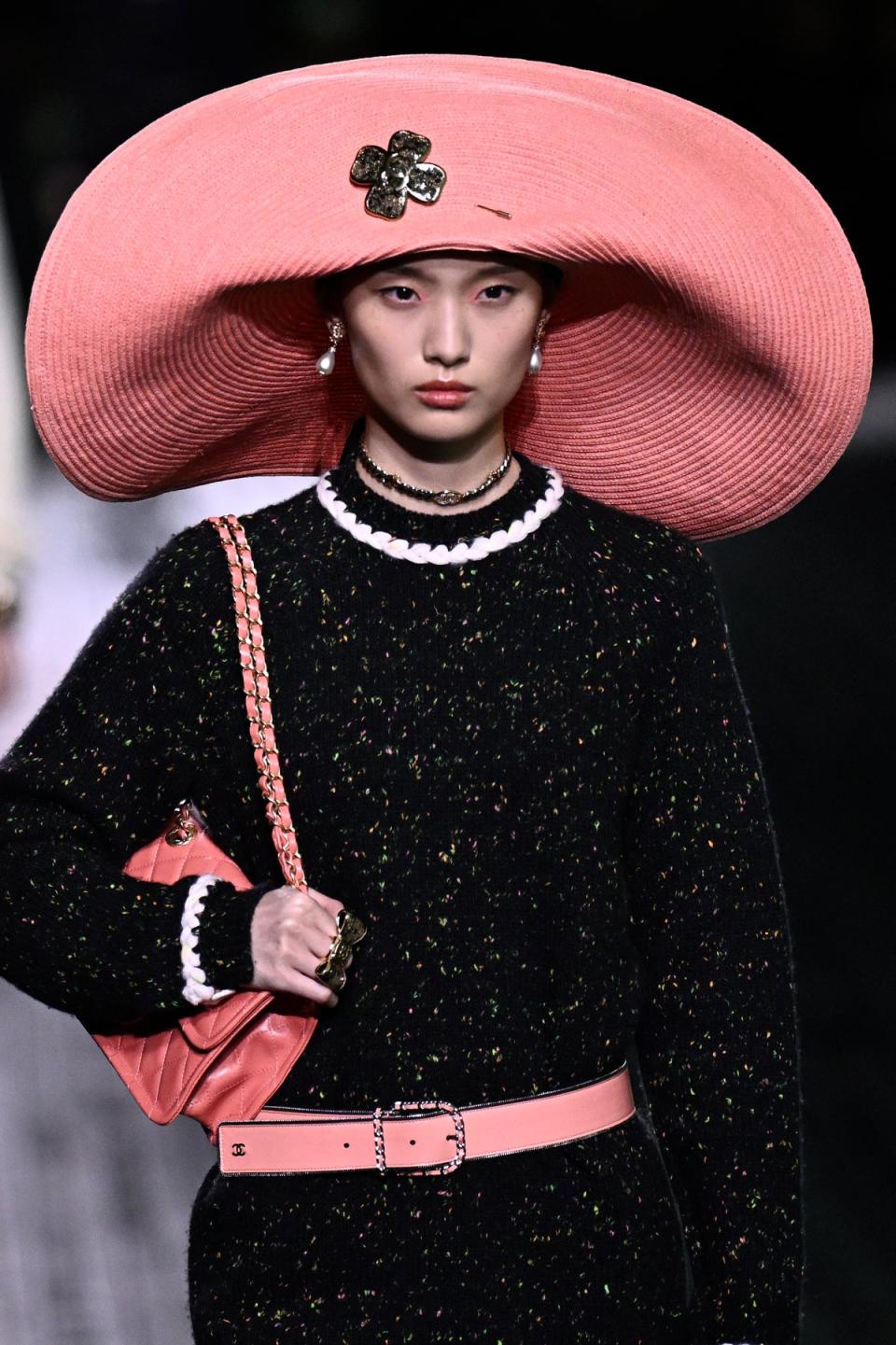 Giant hatted models at Chanel (AFP via Getty Images)