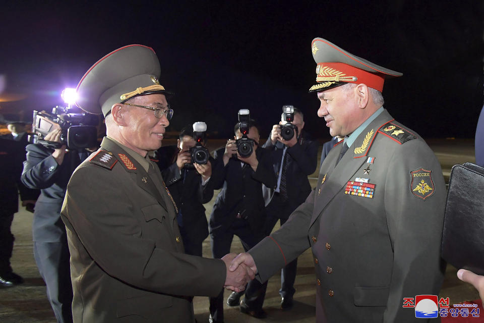 In this photo provided by the North Korean government, Russian Defense Minister Sergei Shoigu, right, is welcomed by North Korean Defense Minister Kang Sun Nam at the Pyongyang International Airport in Pyongyang, North Korea Tuesday, July 25, 2023. Independent journalists were not given access to cover the event depicted in this image distributed by the North Korean government. The content of this image is as provided and cannot be independently verified. Korean language watermark on image as provided by source reads: "KCNA" which is the abbreviation for Korean Central News Agency. (Korean Central News Agency/Korea News Service via AP)