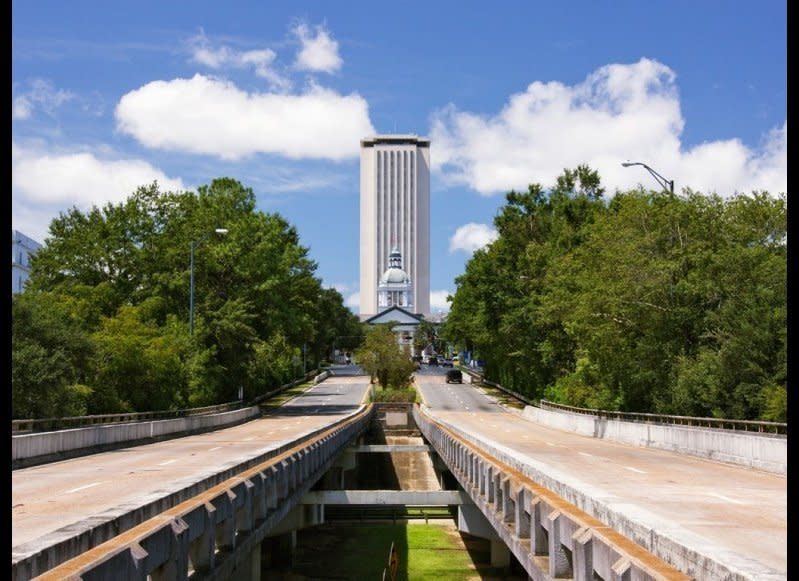 <strong>FLORIDA STATE CAPITOL</strong>  Tallahassee, Florida    Year completed: 1977  <strong>Architectural style</strong>: New Classicism  <strong>FYI: </strong>The current 22-story state capitol towers over its predecessor, a Classical Revival building completed in 1845 that is now the Florida Historic Capitol Museum. Try to spot it from the new capitol’s observation deck, located on the 22nd floor, 307 feet in the air.  <strong>Visit:</strong> Self-guided tours are available Monday through Friday, from 8 a.m. to 5 p.m., except for weekday holidays. Groups of 15 people or more can arrange a guided tour during the week.  